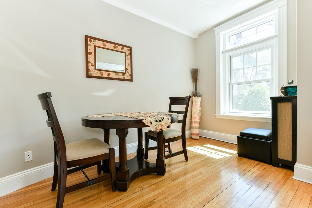 149 Winthrop Road, Unit 3 Brookline, MA 02445 - Photo 7 of 18 a view of a livingroom with furniture and a window