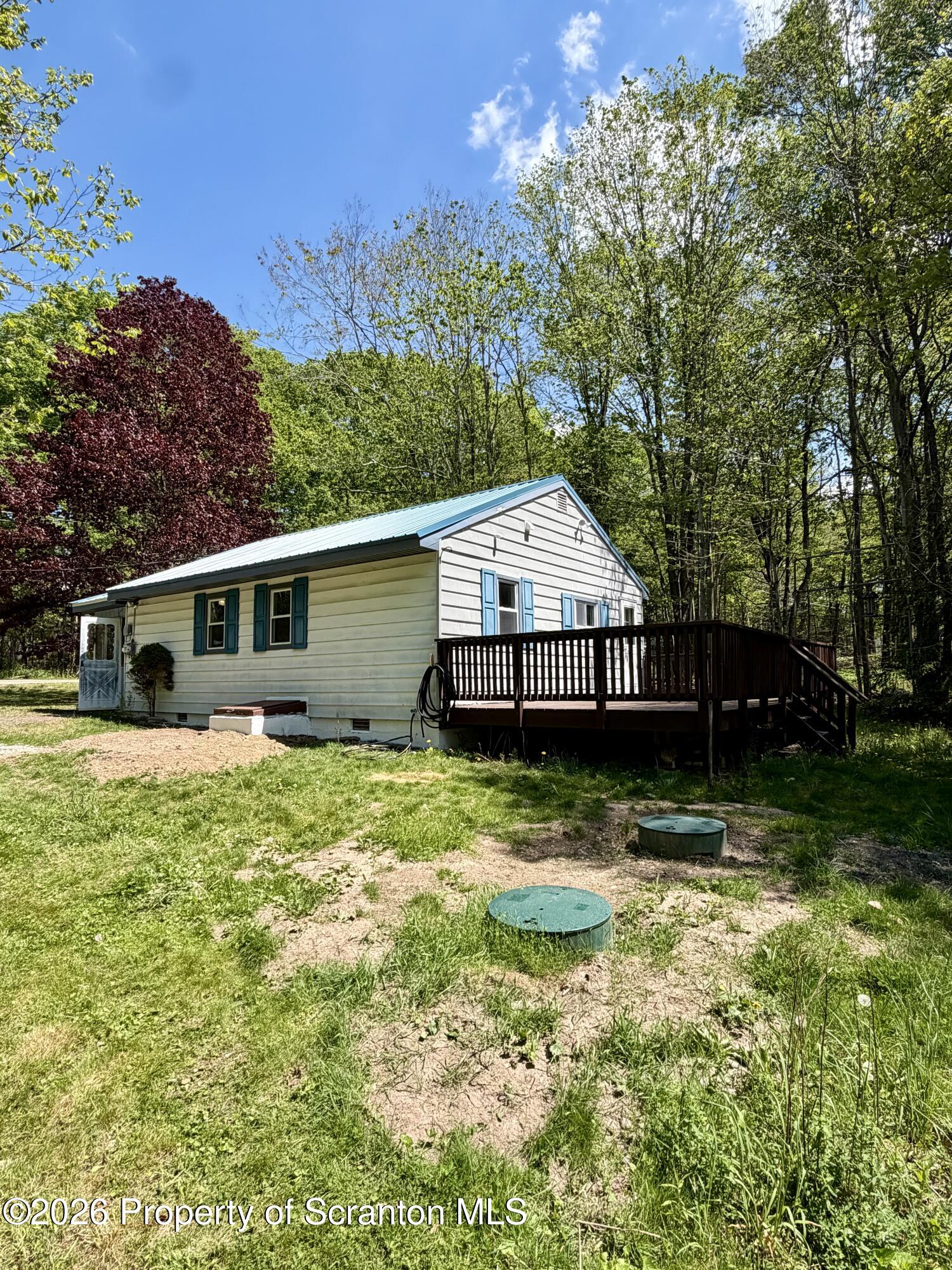 2139 Fawn Path Gouldsboro, PA 18424 - Photo 2 of 9 a view of a house with backyard and garden