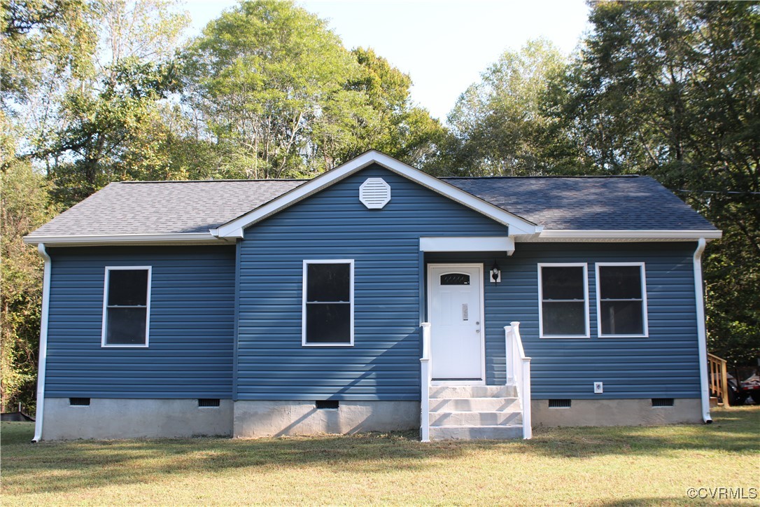 10120 Alpine Road Providence Forge, VA 23140 - Photo 1 of 15 View of front facade with a front lawn