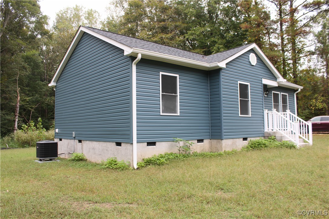 10120 Alpine Road Providence Forge, VA 23140 - Photo 2 of 15 View of property exterior with a yard and central