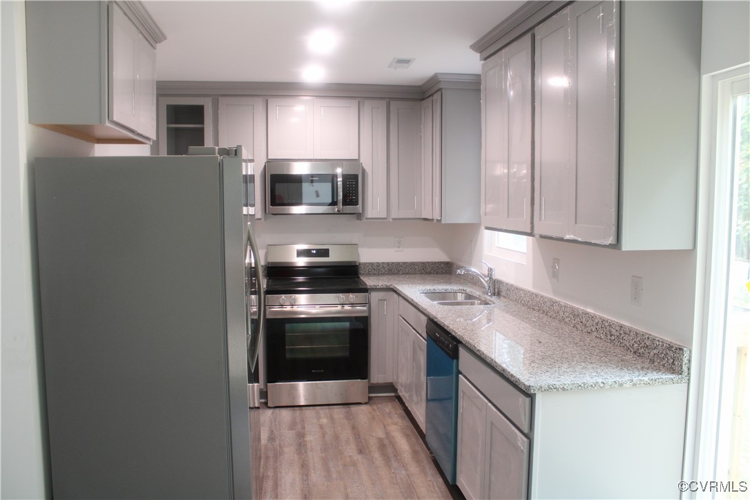 10120 Alpine Road Providence Forge, VA 23140 - Photo 4 of 15 Kitchen with gray cabinets, appliances with stainl
