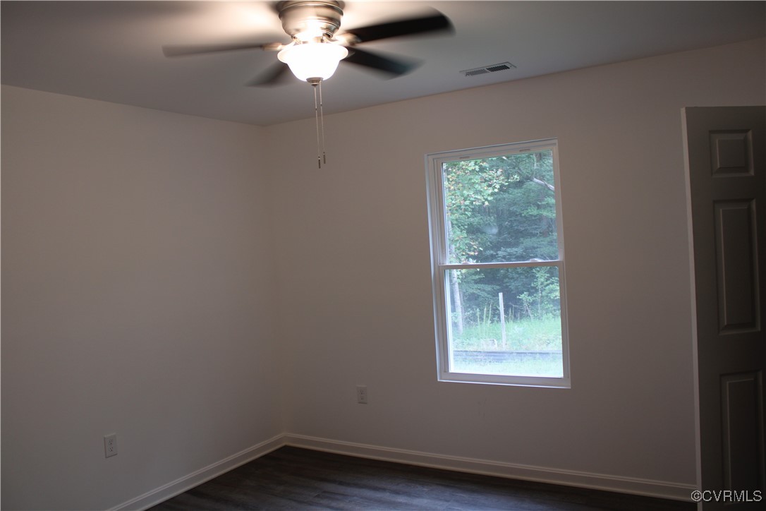 10120 Alpine Road Providence Forge, VA 23140 - Photo 6 of 15 Spare room with dark hardwood / wood-style floors