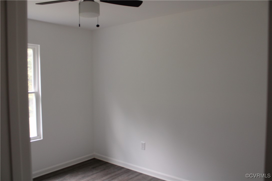 10120 Alpine Road Providence Forge, VA 23140 - Photo 8 of 15 Spare room with ceiling fan and dark hardwood / wo