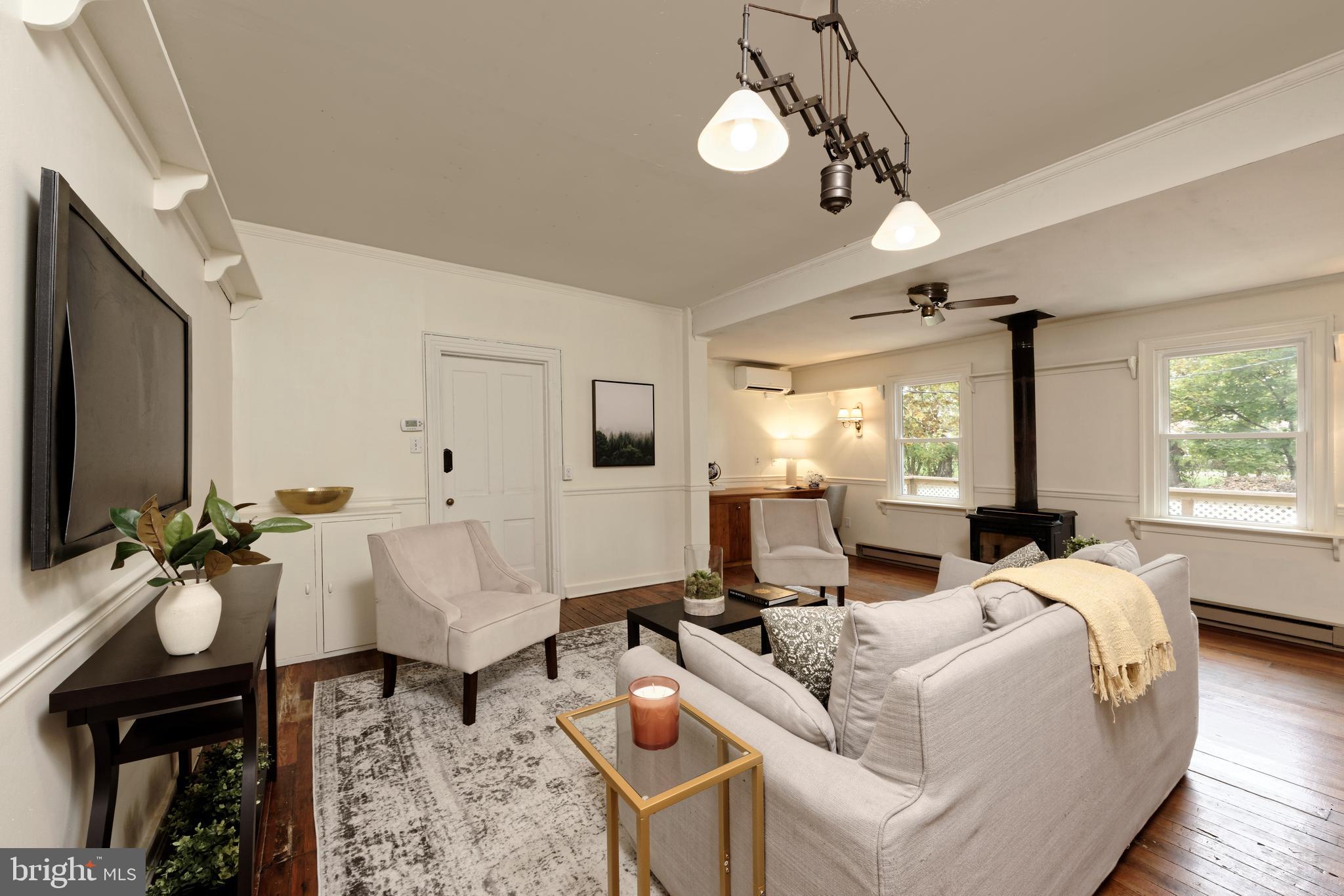 21091 Unison Road Middleburg, VA 20117 - Photo 22 of 65 Spacious Family Room has a woodstove & built-ins