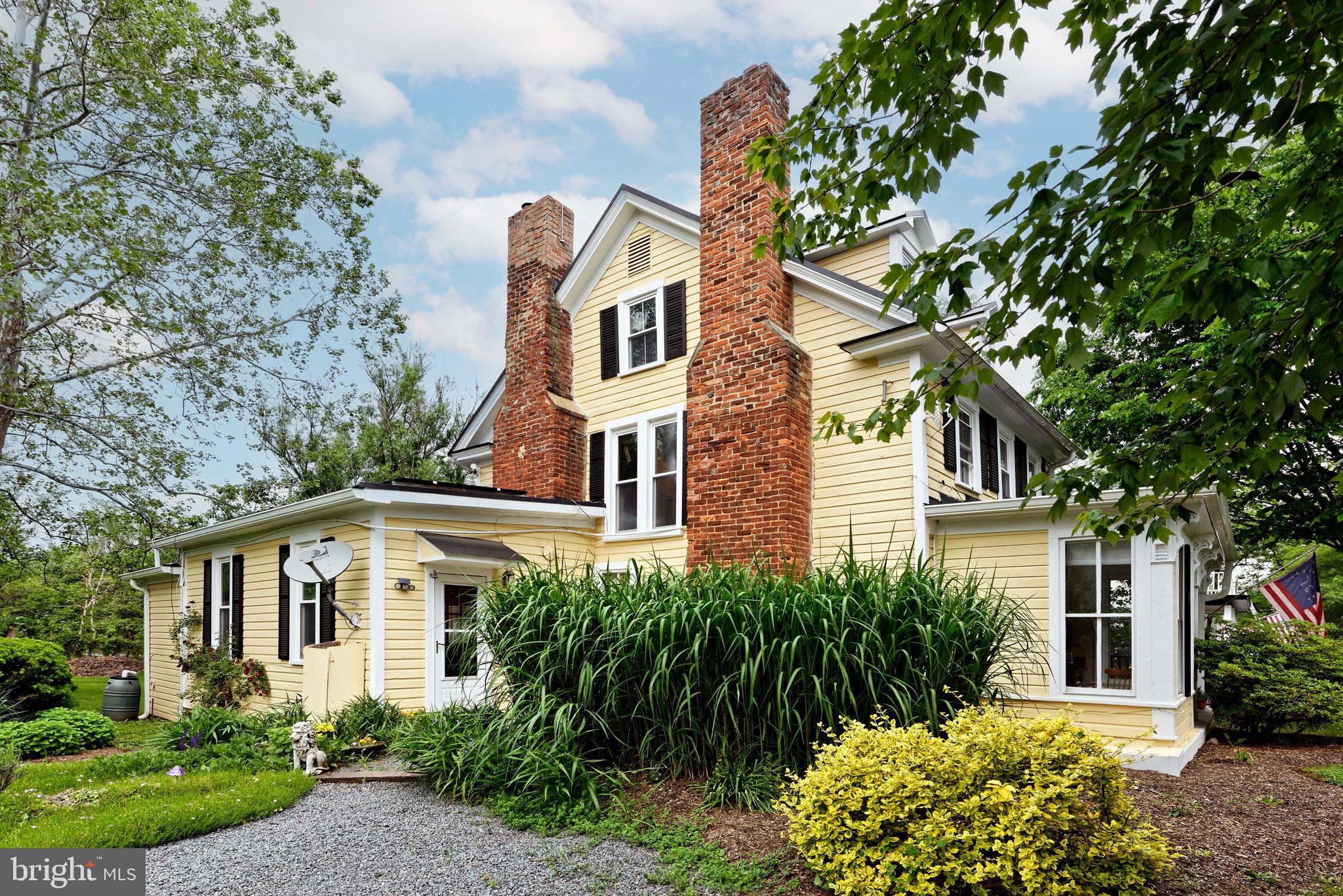 21091 Unison Road Middleburg, VA 20117 - Photo 4 of 65 Double brick chimneys anchor the Northwest side.