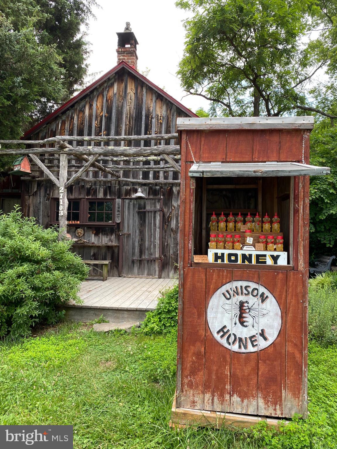 21091 Unison Road Middleburg, VA 20117 - Photo 52 of 65 Unison's very own honey stand.