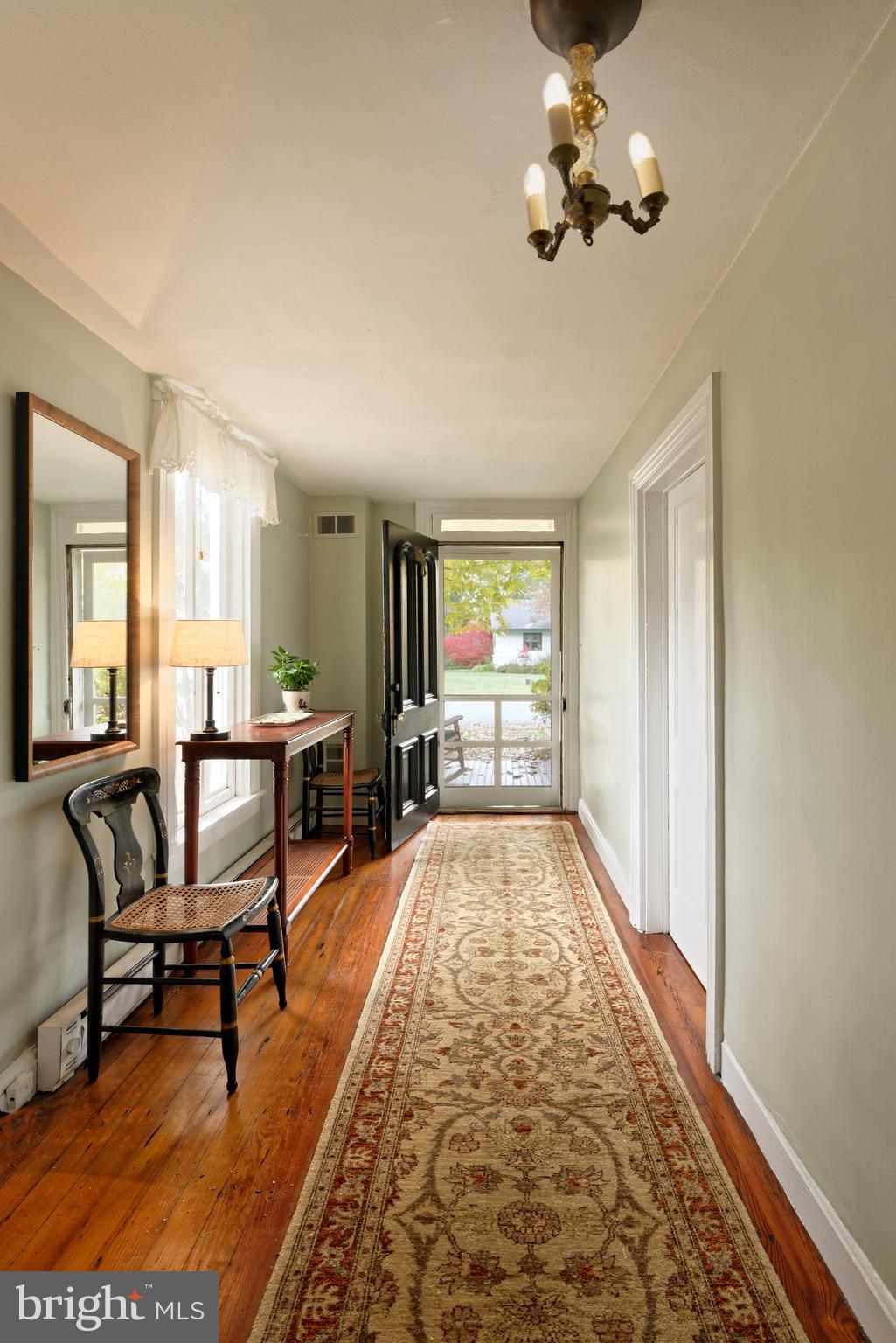 21091 Unison Road Middleburg, VA 20117 - Photo 6 of 65 View of front hallway w/gleaming hardwood floors!
