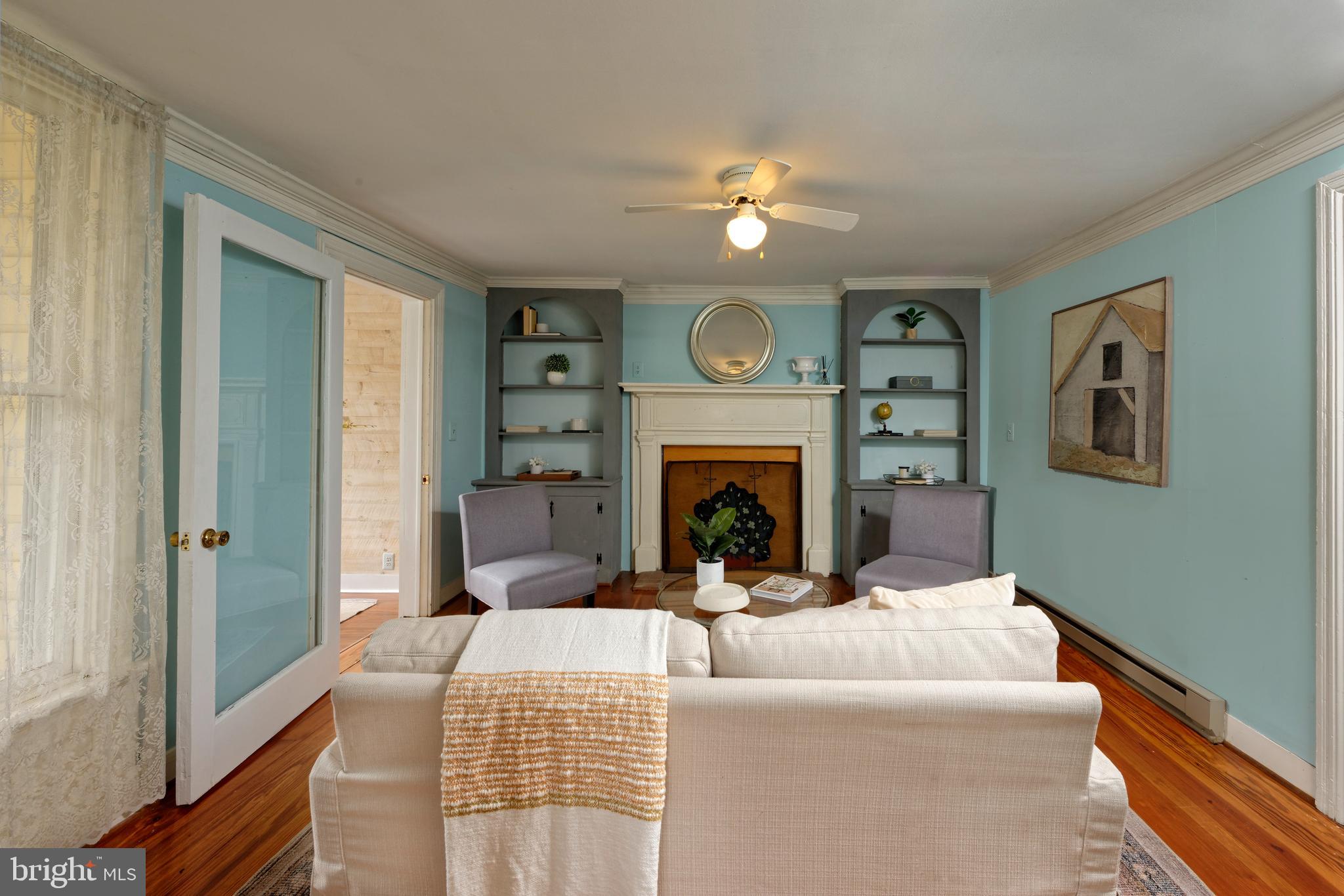 21091 Unison Road Middleburg, VA 20117 - Photo 9 of 65 Living room has an old fireplace (non-working)