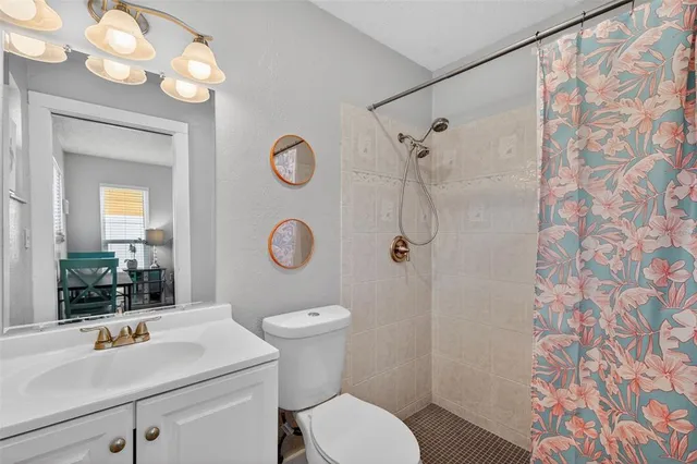 a kitchen with a stove and cabinets