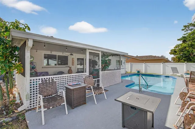 a view of a backyard with a patio