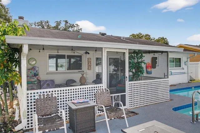 a view of a chairs and table in the terrace