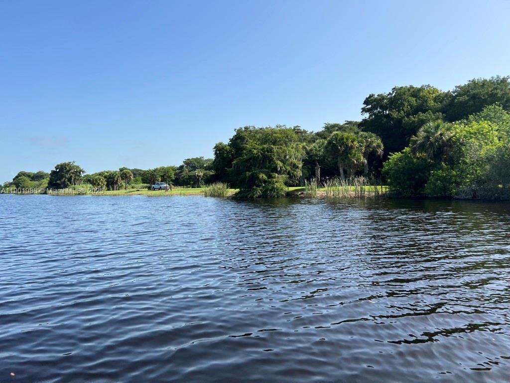 12600 Southwest Conners Highway Okeechobee, FL 34974 - Photo 33 of 60 a view of lake with green space
