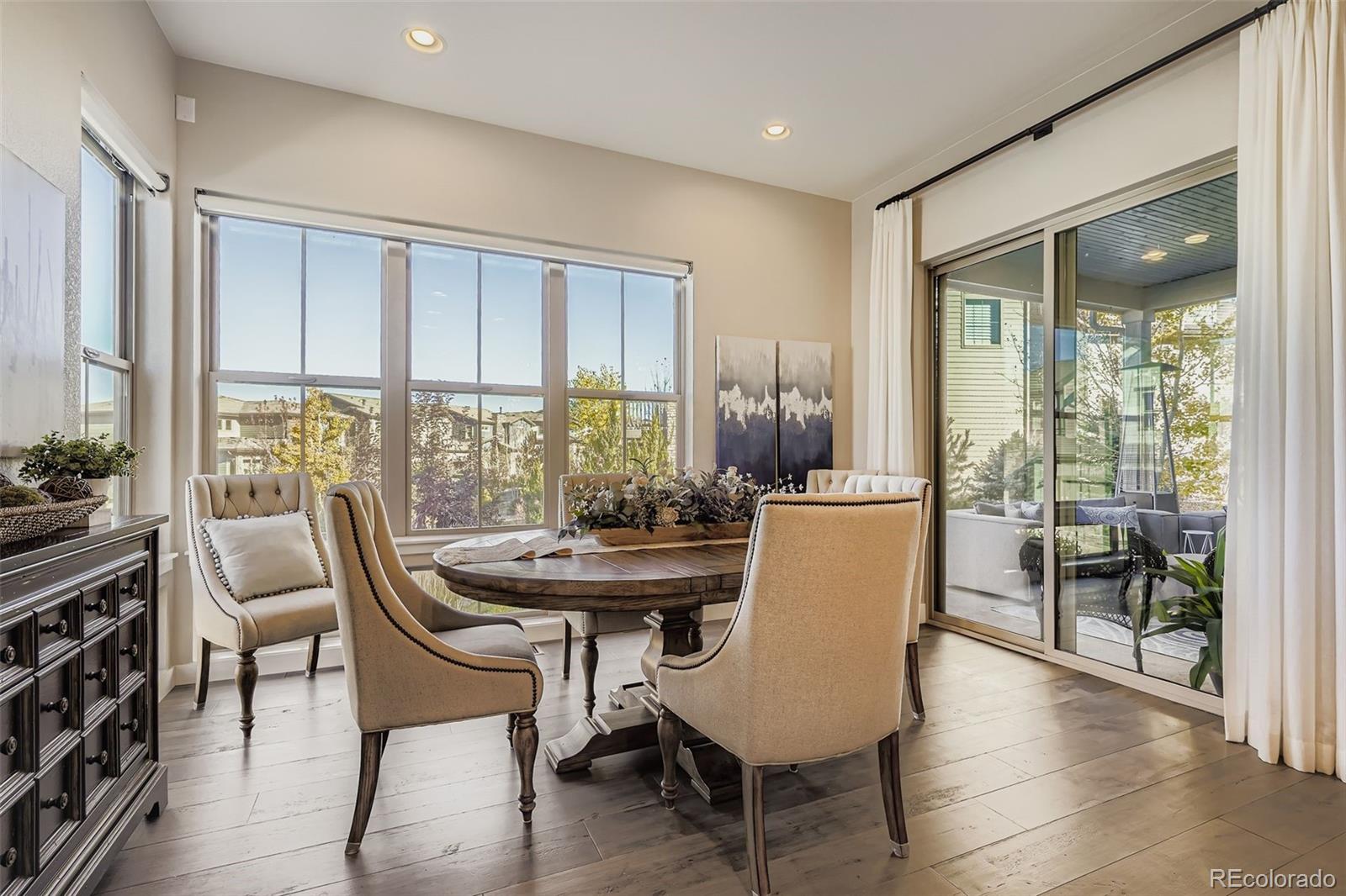 10414 Maplebrook Way Highlands Ranch, CO 80126 - Photo 6 of 45 a view of a dining room with furniture window and outside view