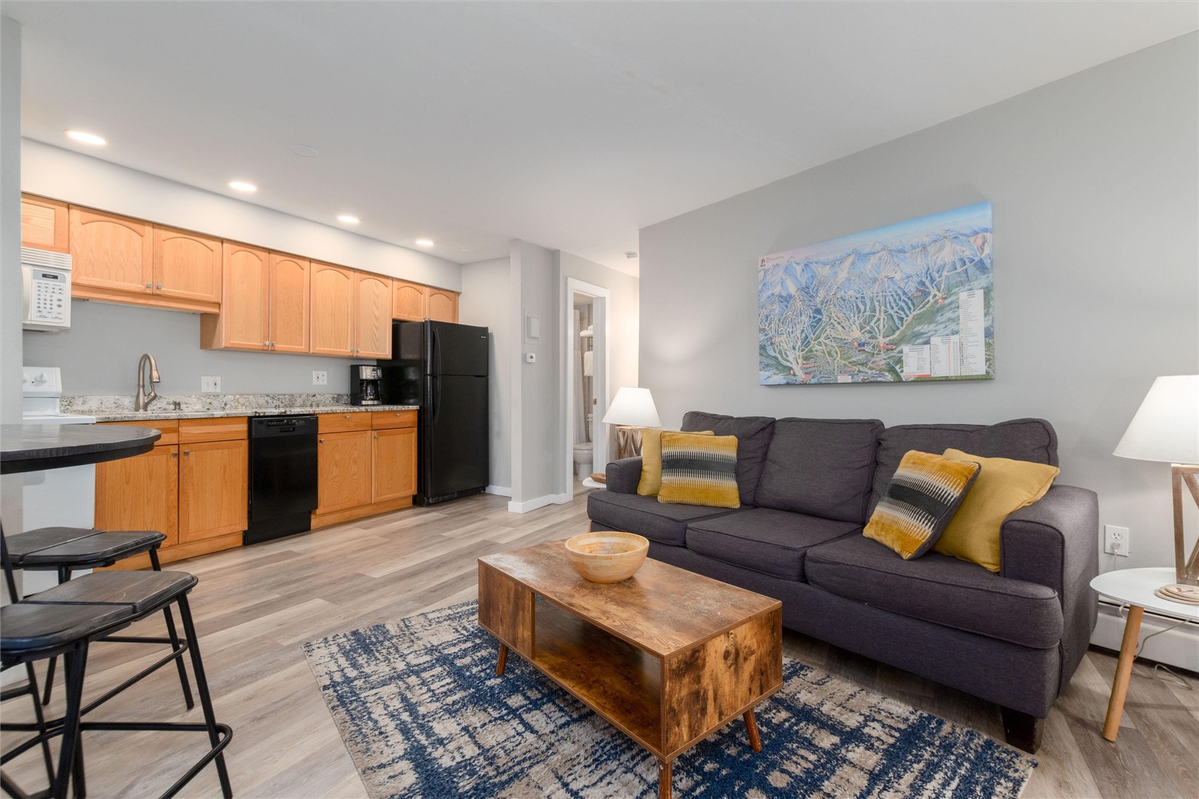 1140 Ski Hill Road, Unit 27 Breckenridge, CO 80424 - Photo 15 of 26 a living room with furniture and kitchen view