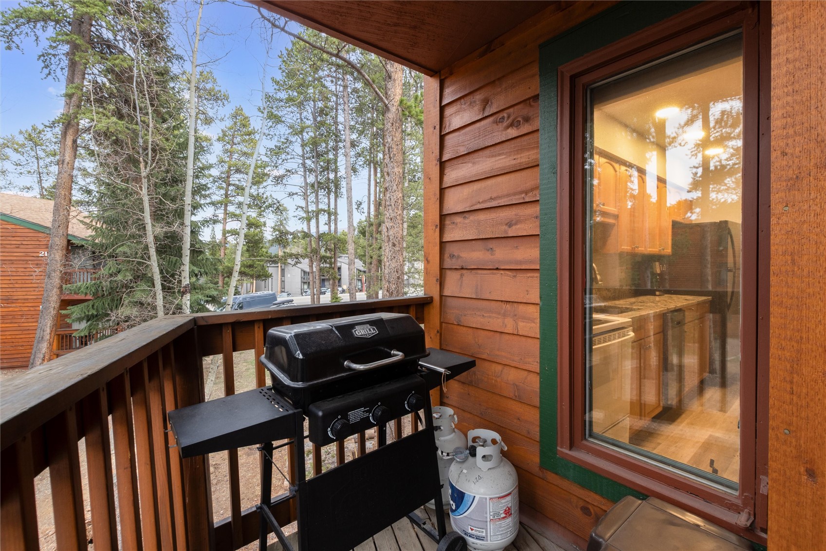 1140 Ski Hill Road, Unit 27 Breckenridge, CO 80424 - Photo 19 of 26 a view of a city from a balcony with furniture