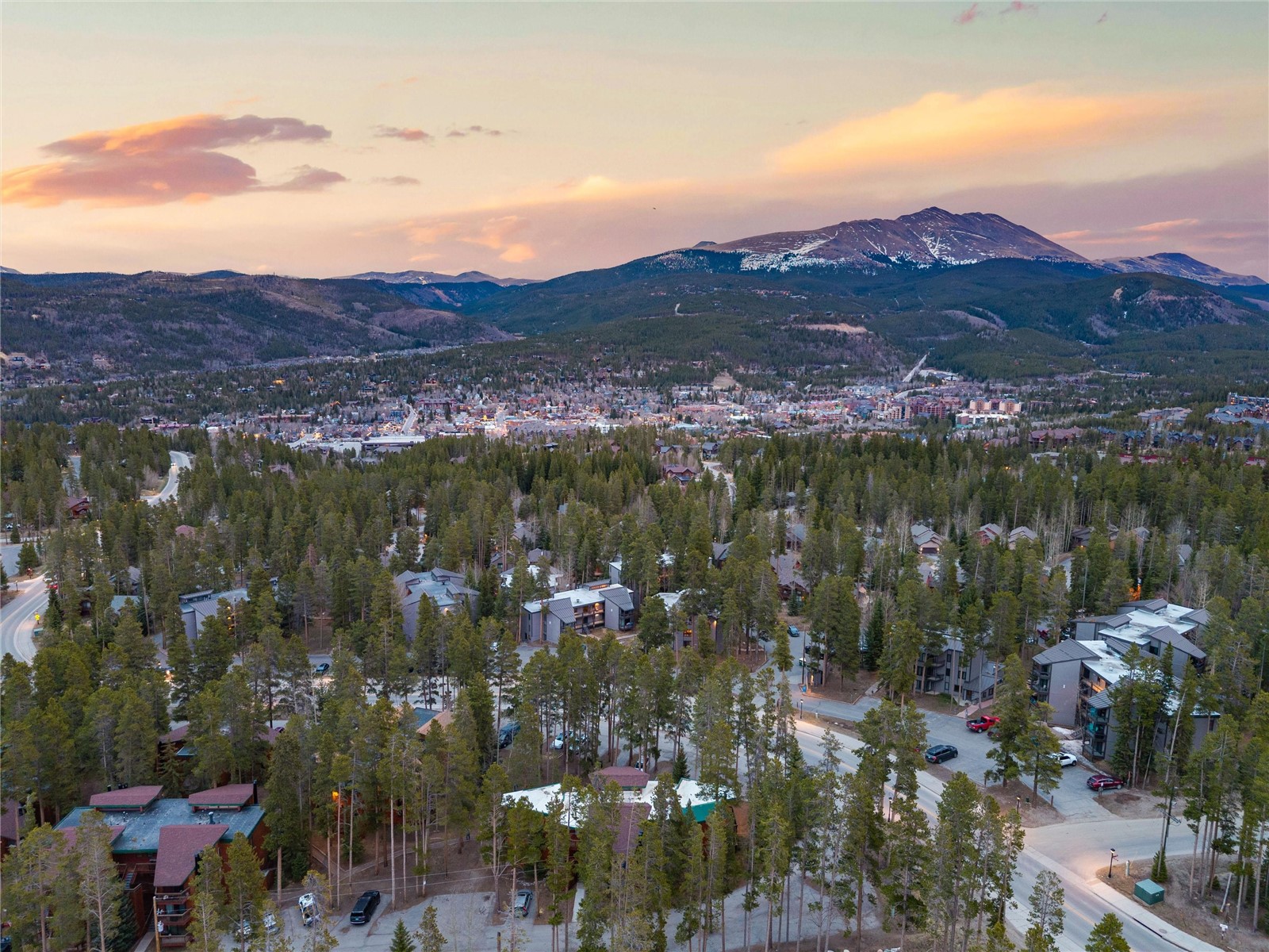 1140 Ski Hill Road, Unit 27 Breckenridge, CO 80424 - Photo 21 of 26 a view of a city with mountains in the background