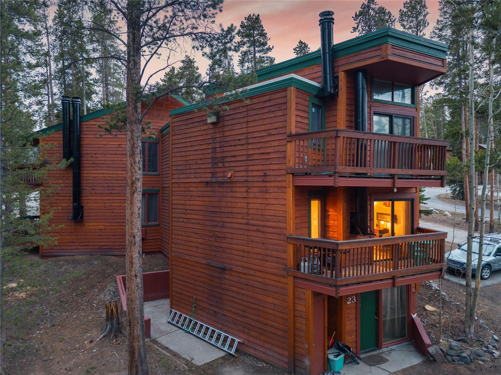 1140 Ski Hill Road, Unit 27 Breckenridge, CO 80424 - Photo 23 of 26 a front view of a house with a porch