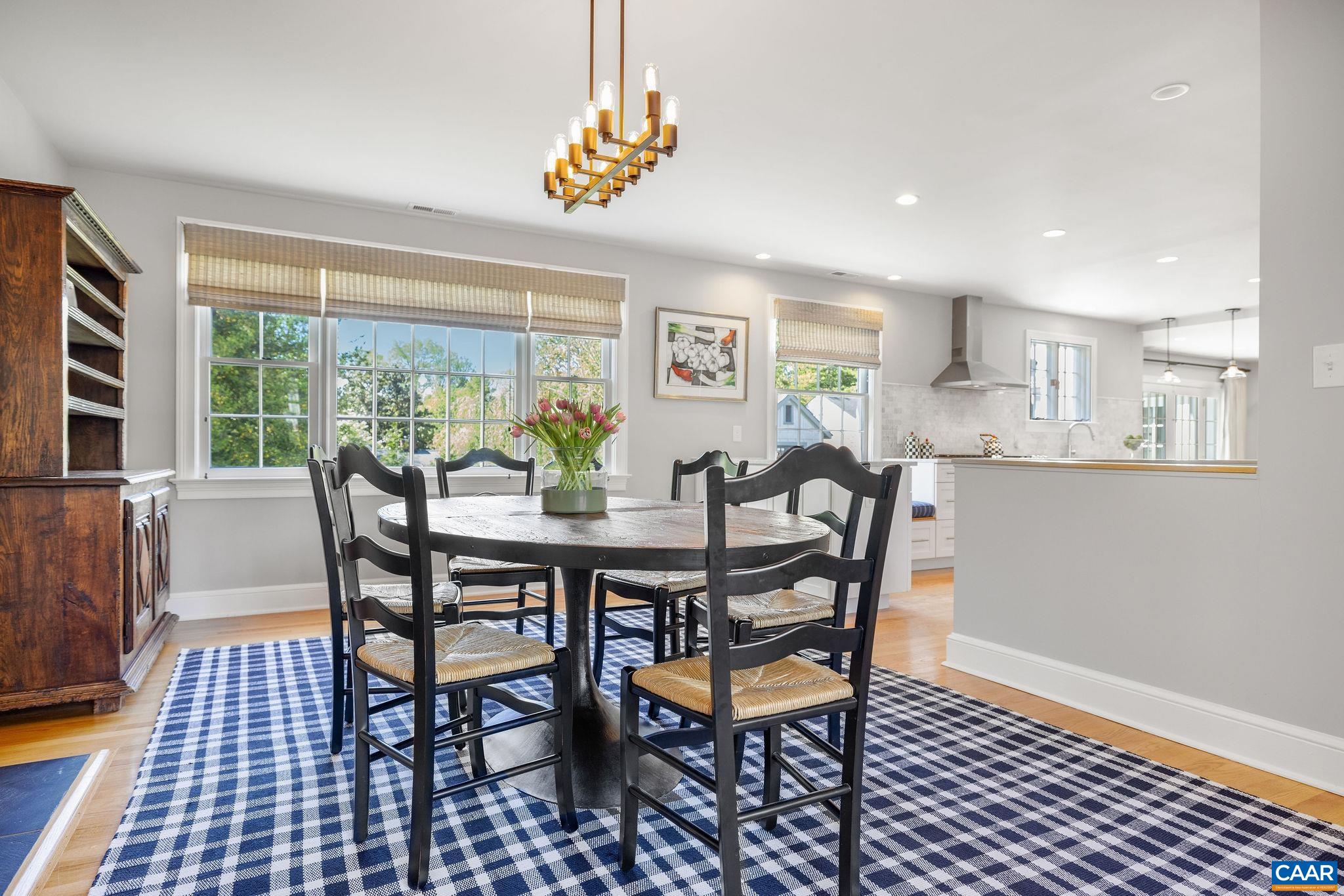 1504 Rugby Avenue Charlottesville, VA 22903 - Photo 16 of 51 a view of a dining room with furniture window and outside view