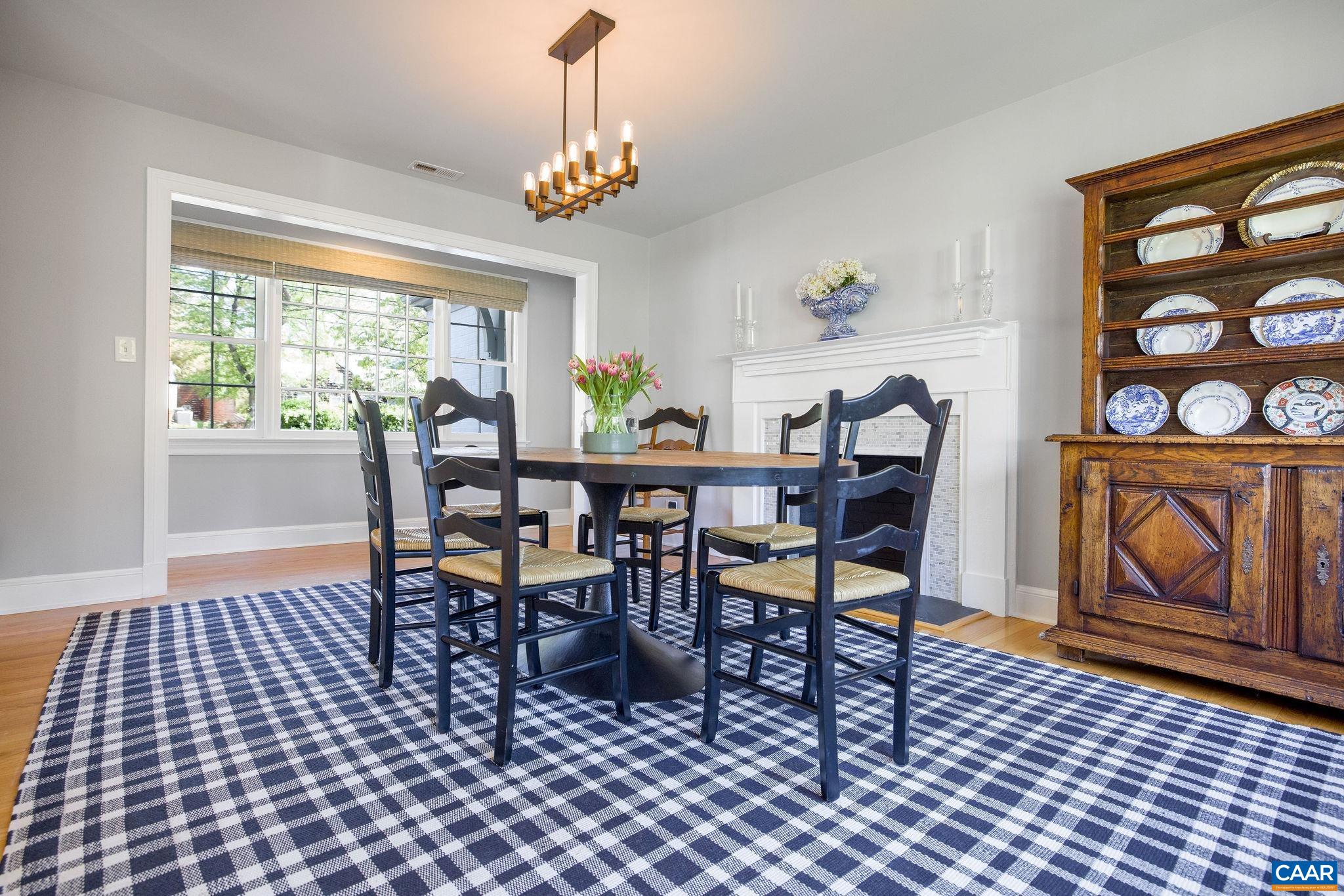 1504 Rugby Avenue Charlottesville, VA 22903 - Photo 17 of 51 a view of a dining room with furniture window and outside view