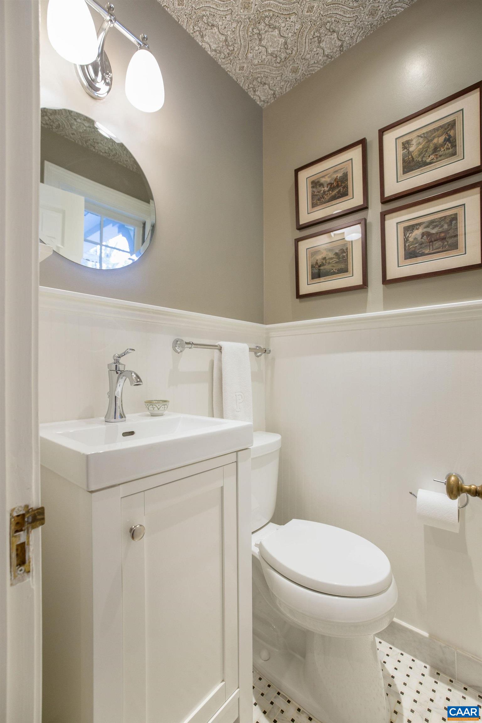 1504 Rugby Avenue Charlottesville, VA 22903 - Photo 26 of 51 a bathroom with a toilet sink and mirror