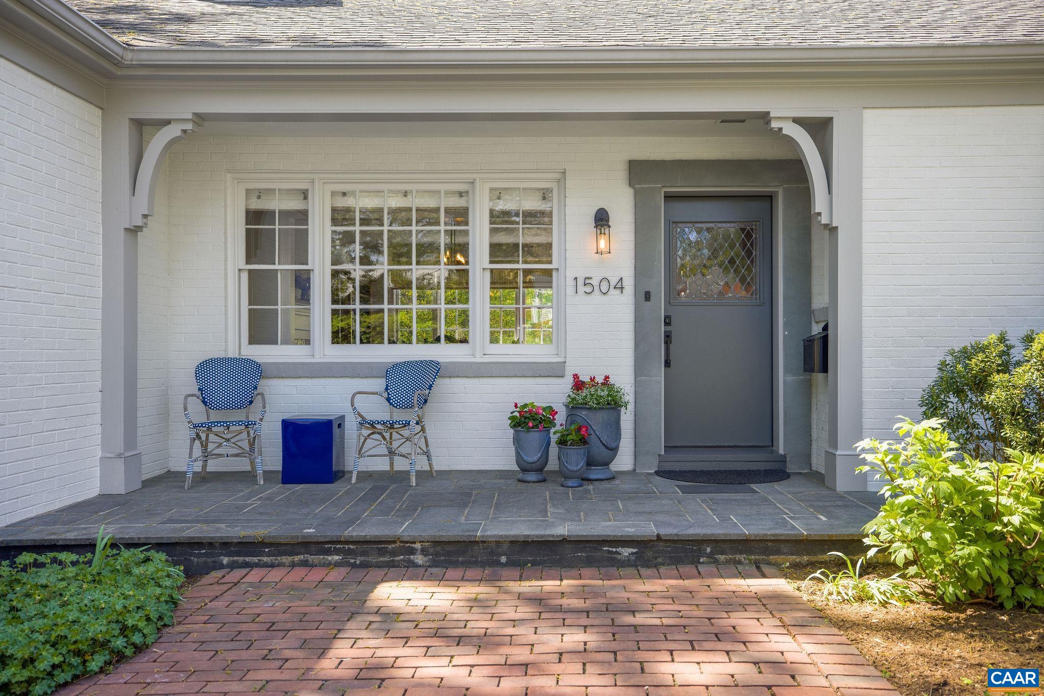 1504 Rugby Avenue Charlottesville, VA 22903 - Photo 3 of 51 a front view of a house with a yard