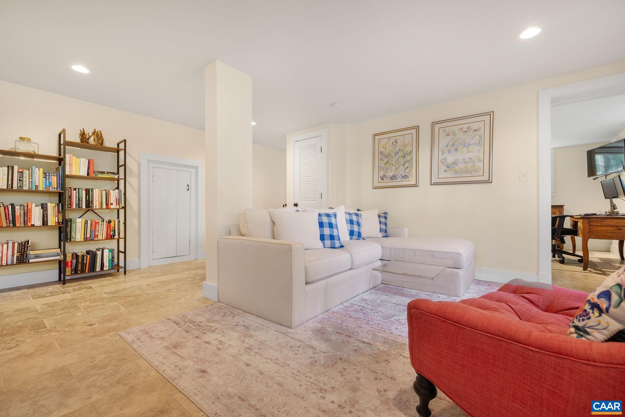 1504 Rugby Avenue Charlottesville, VA 22903 - Photo 34 of 51 a living room with furniture and white walls