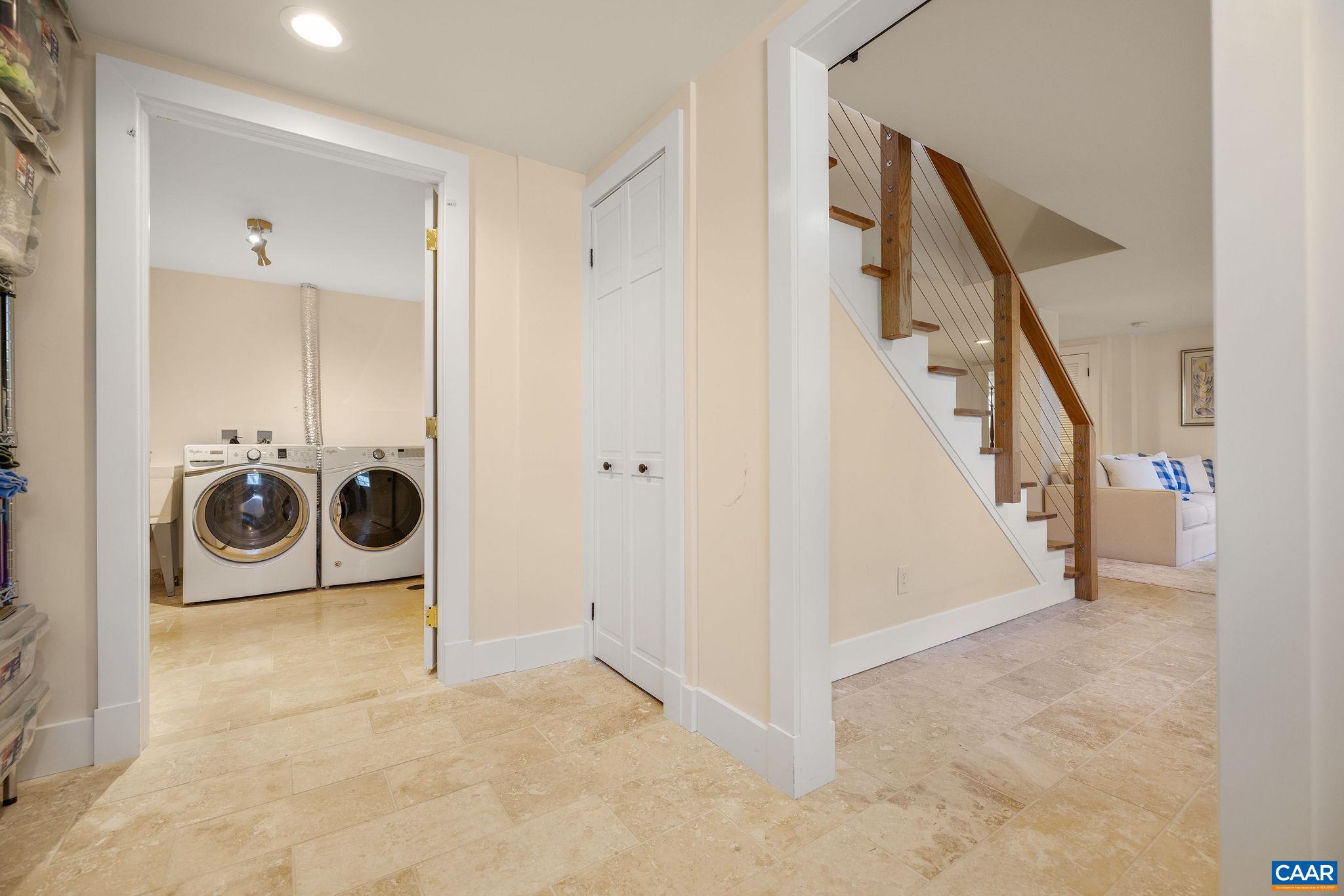 1504 Rugby Avenue Charlottesville, VA 22903 - Photo 41 of 51 a view of a storage & utility room with a washer and dryer