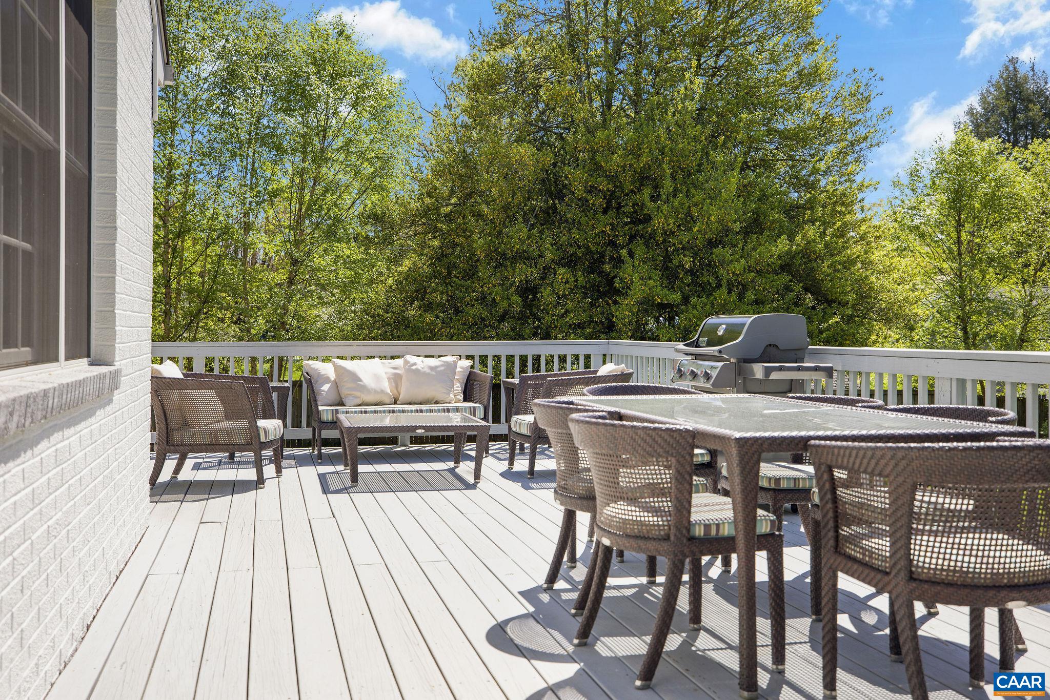 1504 Rugby Avenue Charlottesville, VA 22903 - Photo 43 of 51 a roof deck with a table and chairs