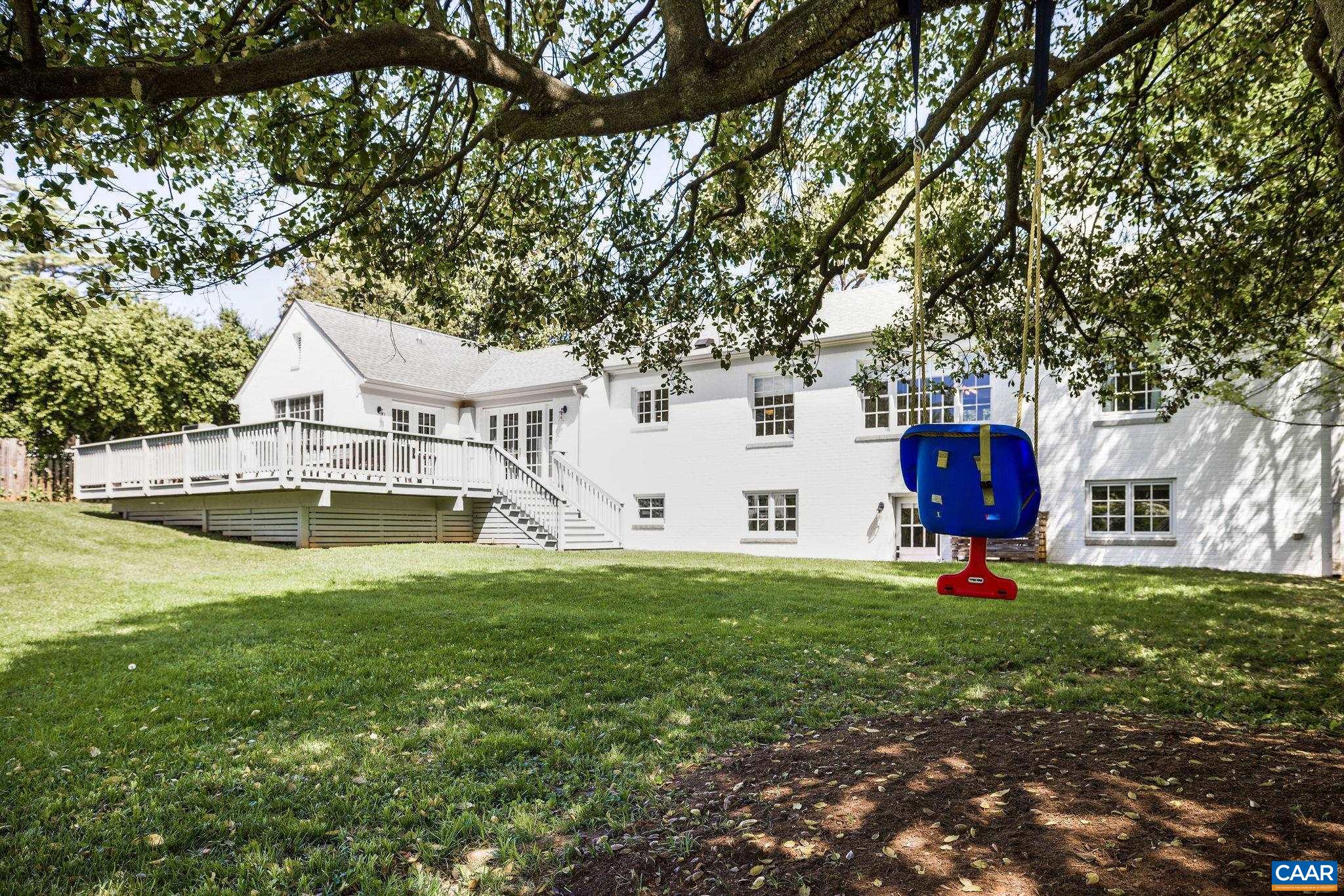 1504 Rugby Avenue Charlottesville, VA 22903 - Photo 46 of 51 a view of pool with lawn chairs and a large tree