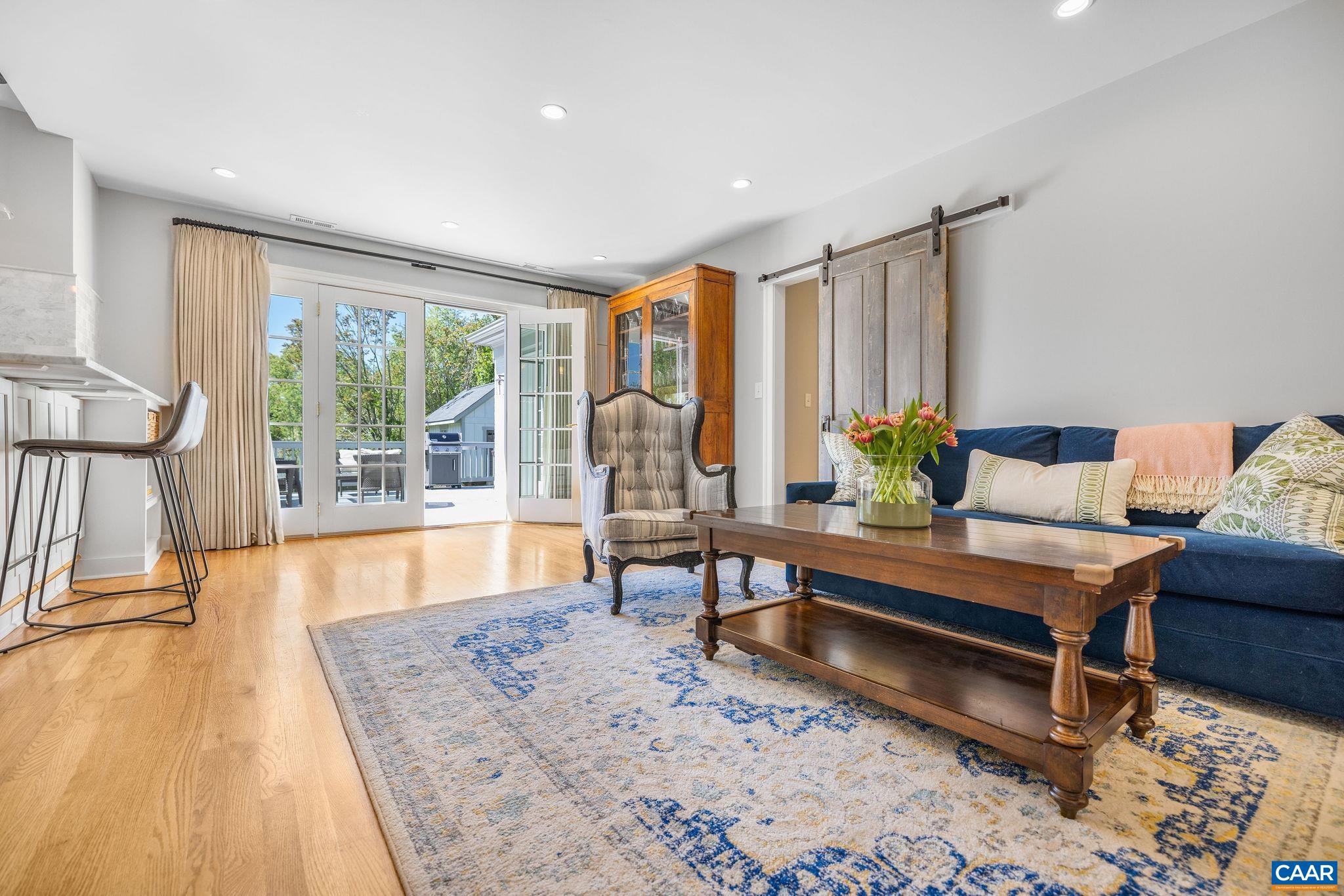 1504 Rugby Avenue Charlottesville, VA 22903 - Photo 10 of 51 a living room with furniture and a large window