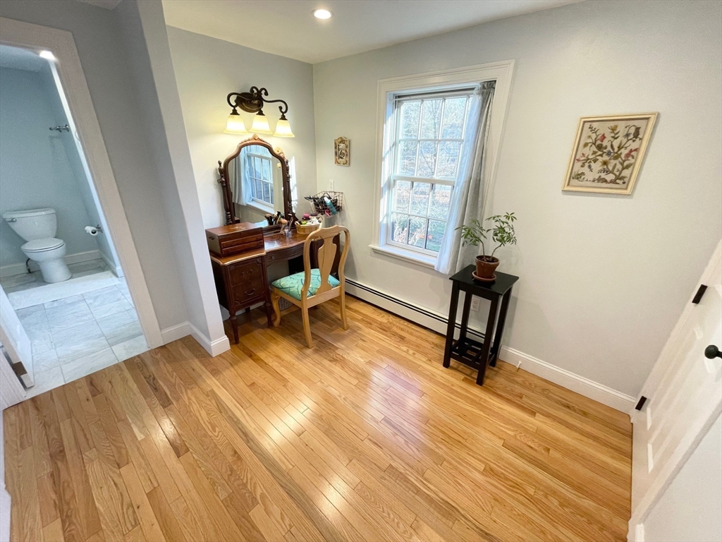 71 Morse Street Sharon, MA 02067 - Photo 19 of 40 a living room with furniture and a window