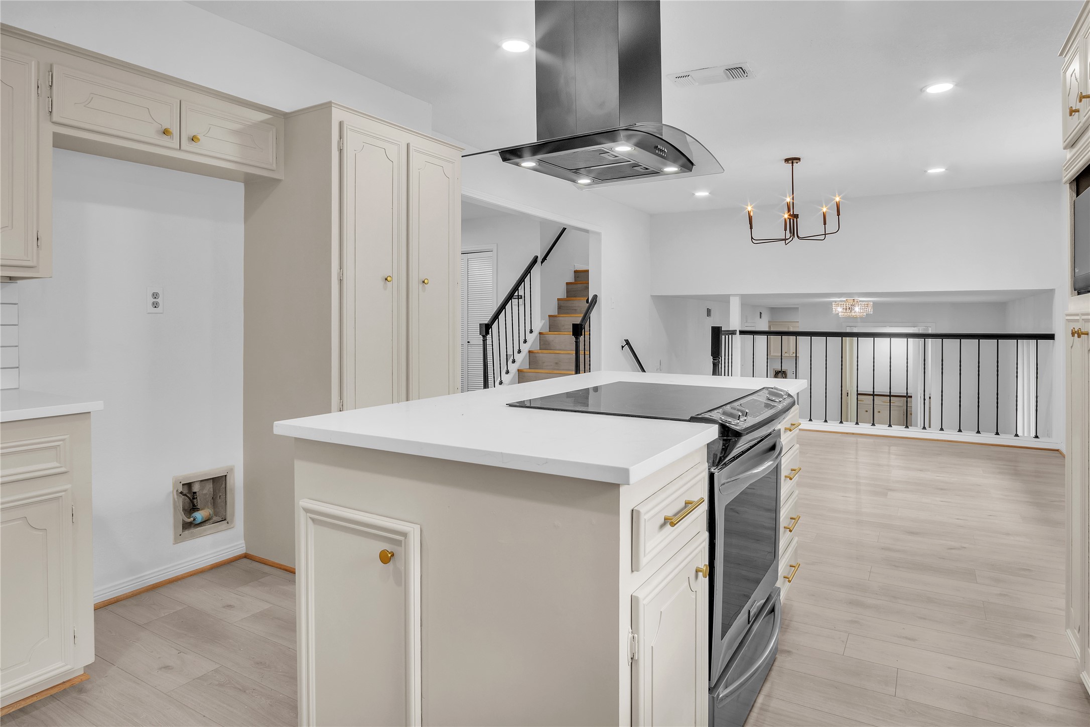 108 Woodland Road Lake Jackson, TX 77566 - Photo 15 of 50 a kitchen with a stove a refrigerator and a microwave