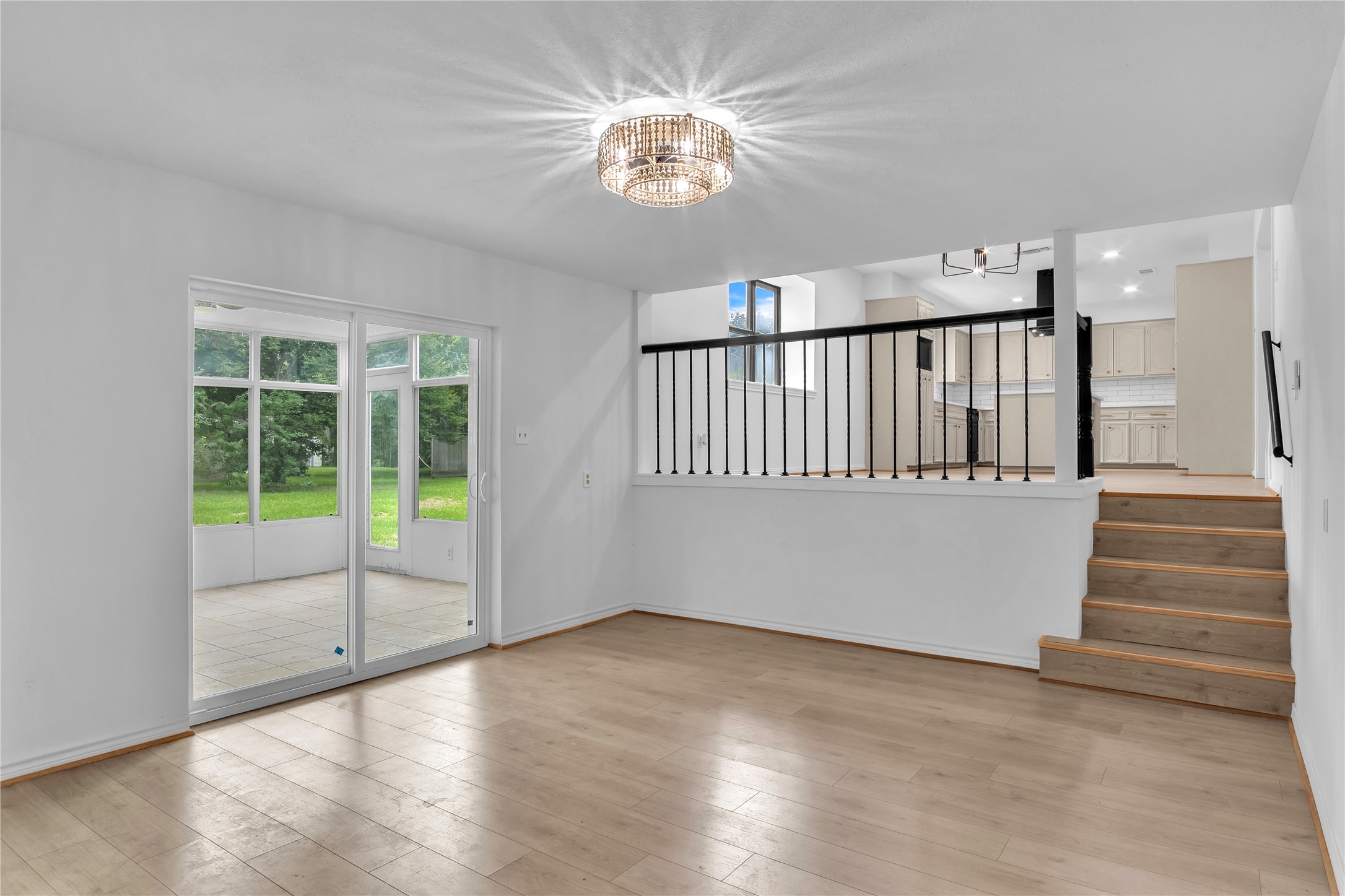 108 Woodland Road Lake Jackson, TX 77566 - Photo 19 of 50 wooden floor in an empty room with a window