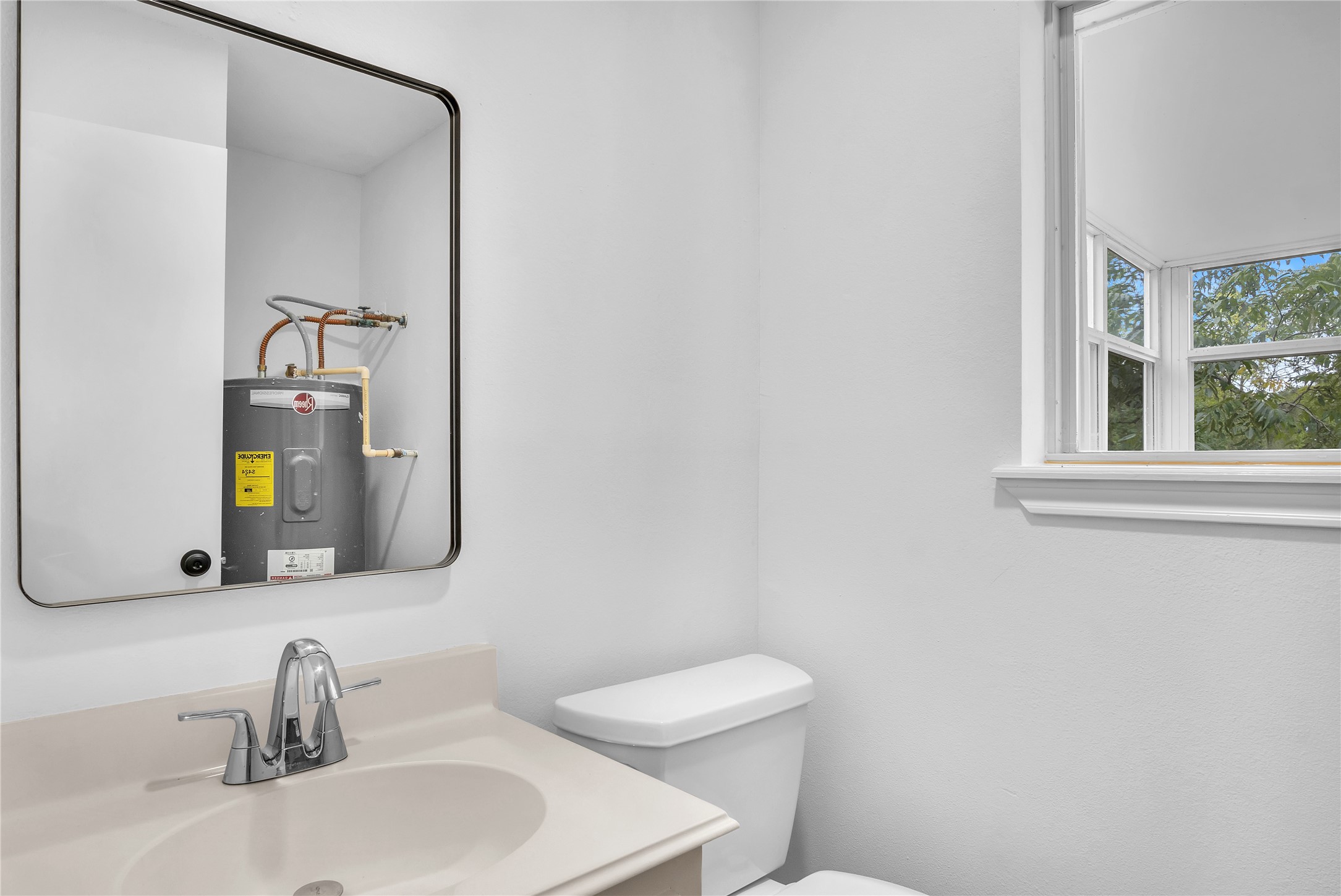 108 Woodland Road Lake Jackson, TX 77566 - Photo 21 of 50 a bathroom with a sink and a mirror