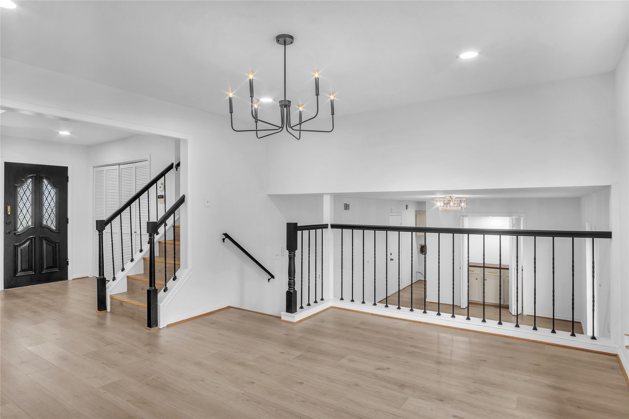 108 Woodland Road Lake Jackson, TX 77566 - Photo 10 of 50 a view of an empty room with wooden floor