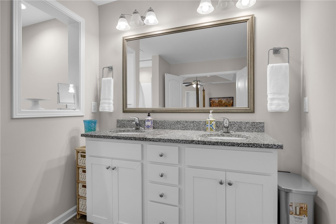 430 Johnson Road Central, SC 29630 - Photo 14 of 36 Dual vanity with polished granite counters and individual mirrors provide ample space in this refreshed bathroom.