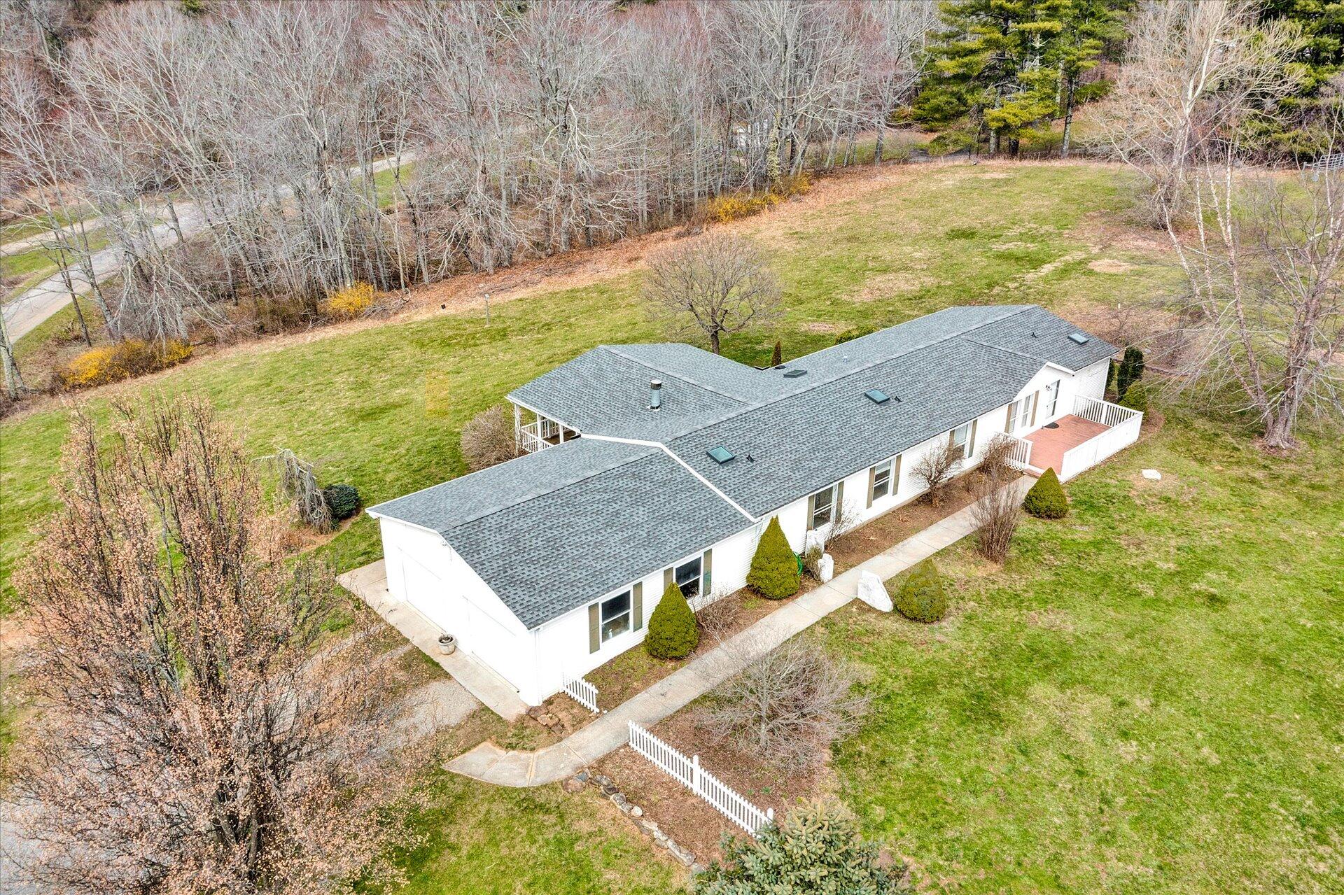 2121 Cannady School Road Southeast Floyd, VA 24091 - Photo 1 of 41 a view of a house with a yard
