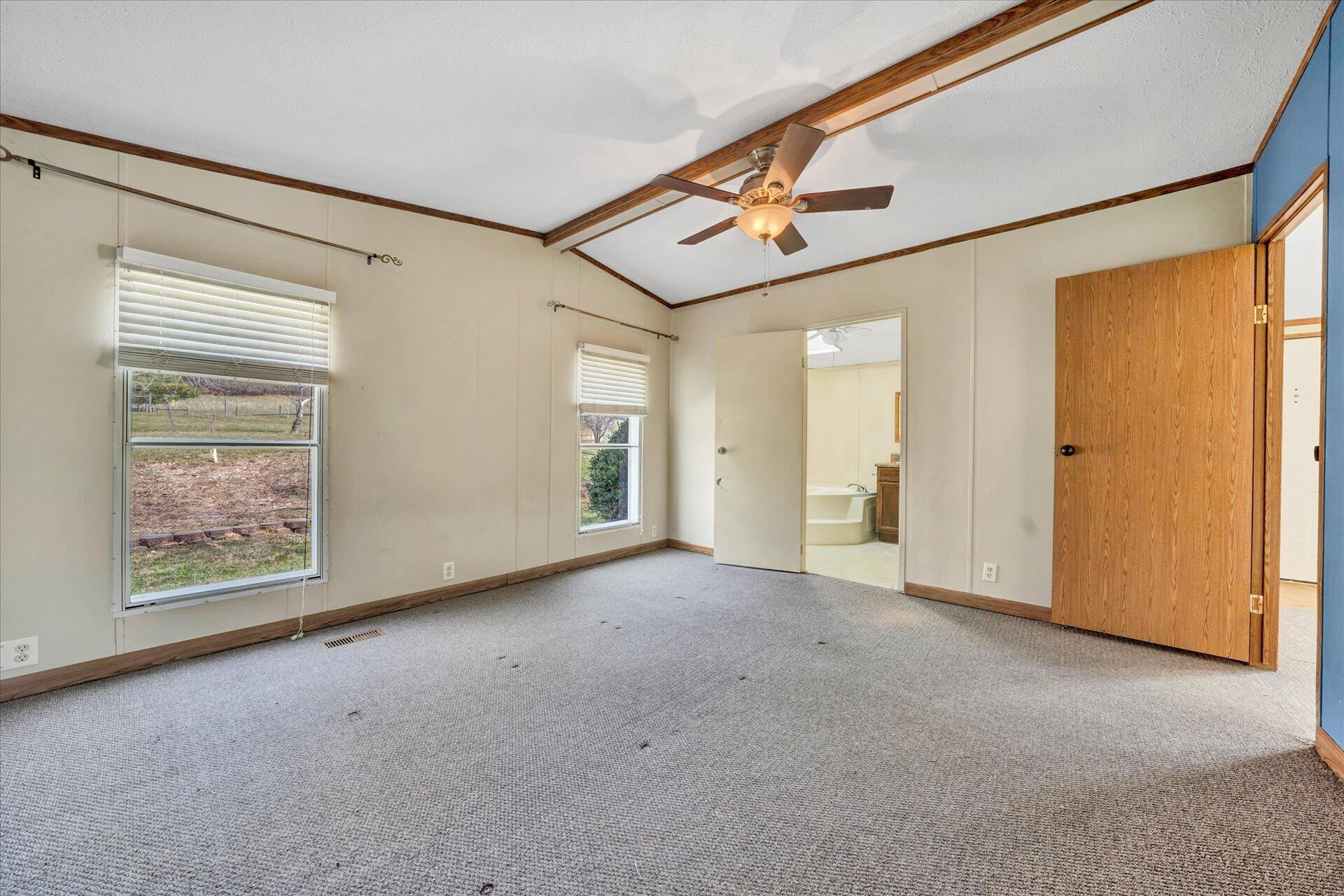 2121 Cannady School Road Southeast Floyd, VA 24091 - Photo 13 of 41 an empty room with windows and closet