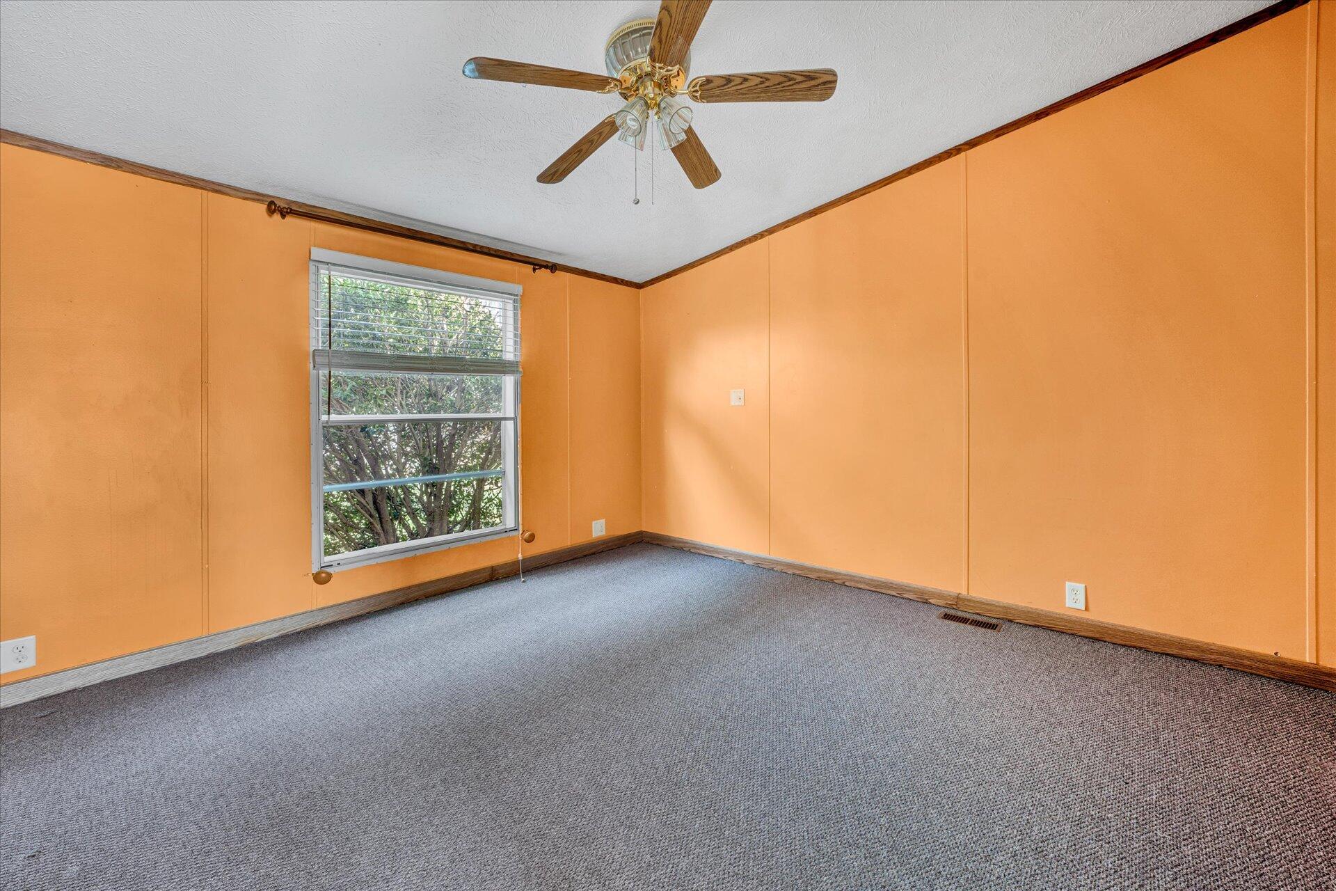 2121 Cannady School Road Southeast Floyd, VA 24091 - Photo 17 of 41 an empty room with windows and entrance
