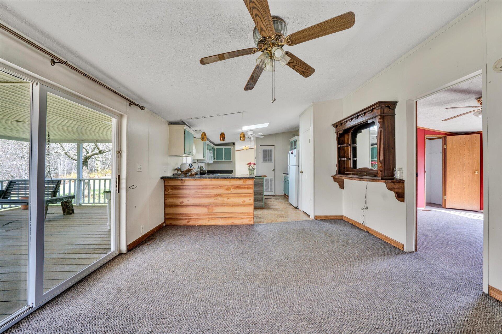 2121 Cannady School Road Southeast Floyd, VA 24091 - Photo 28 of 41 a view of livingroom with hardwood floor and a ceiling fan