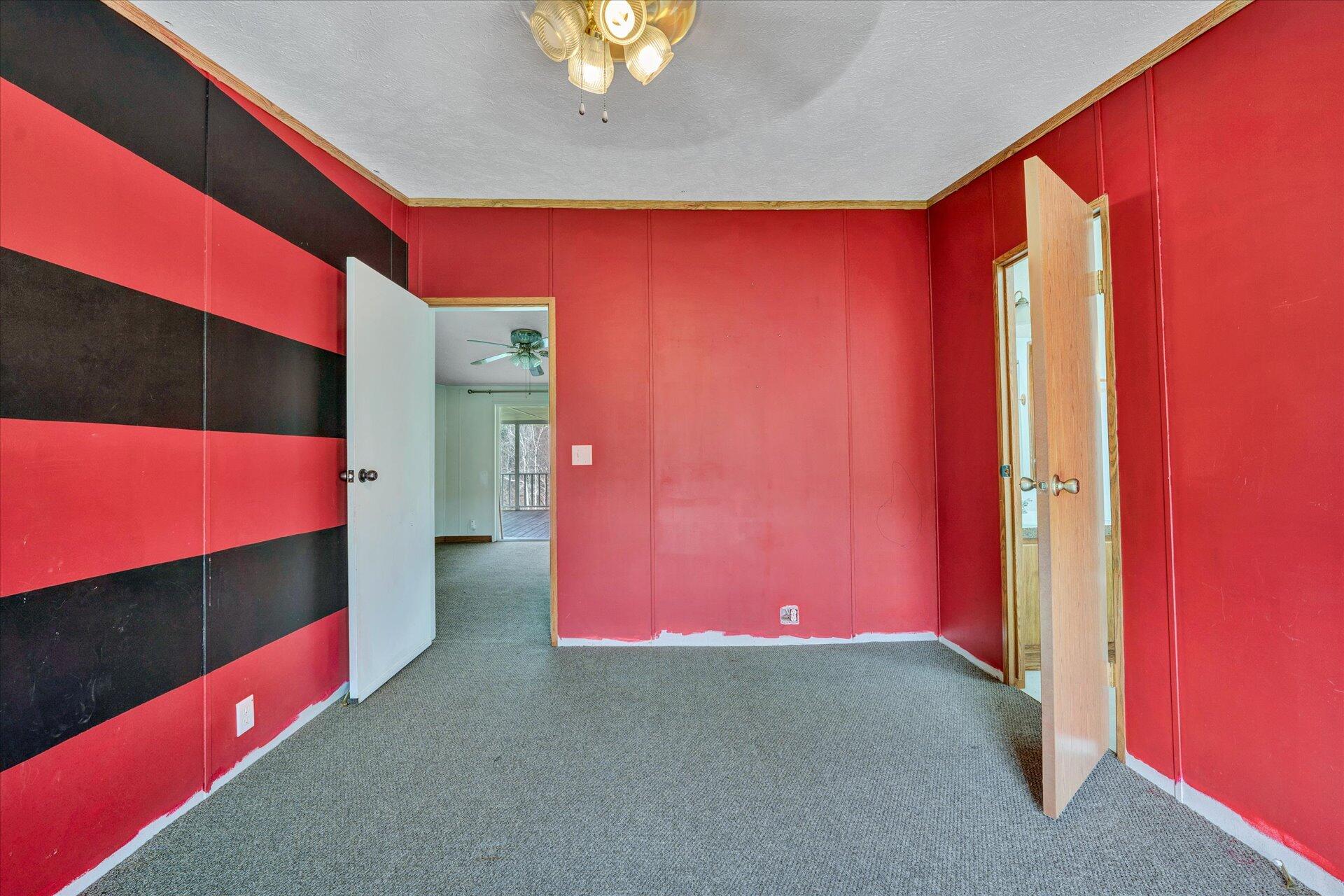 2121 Cannady School Road Southeast Floyd, VA 24091 - Photo 32 of 41 an empty room with painted walls