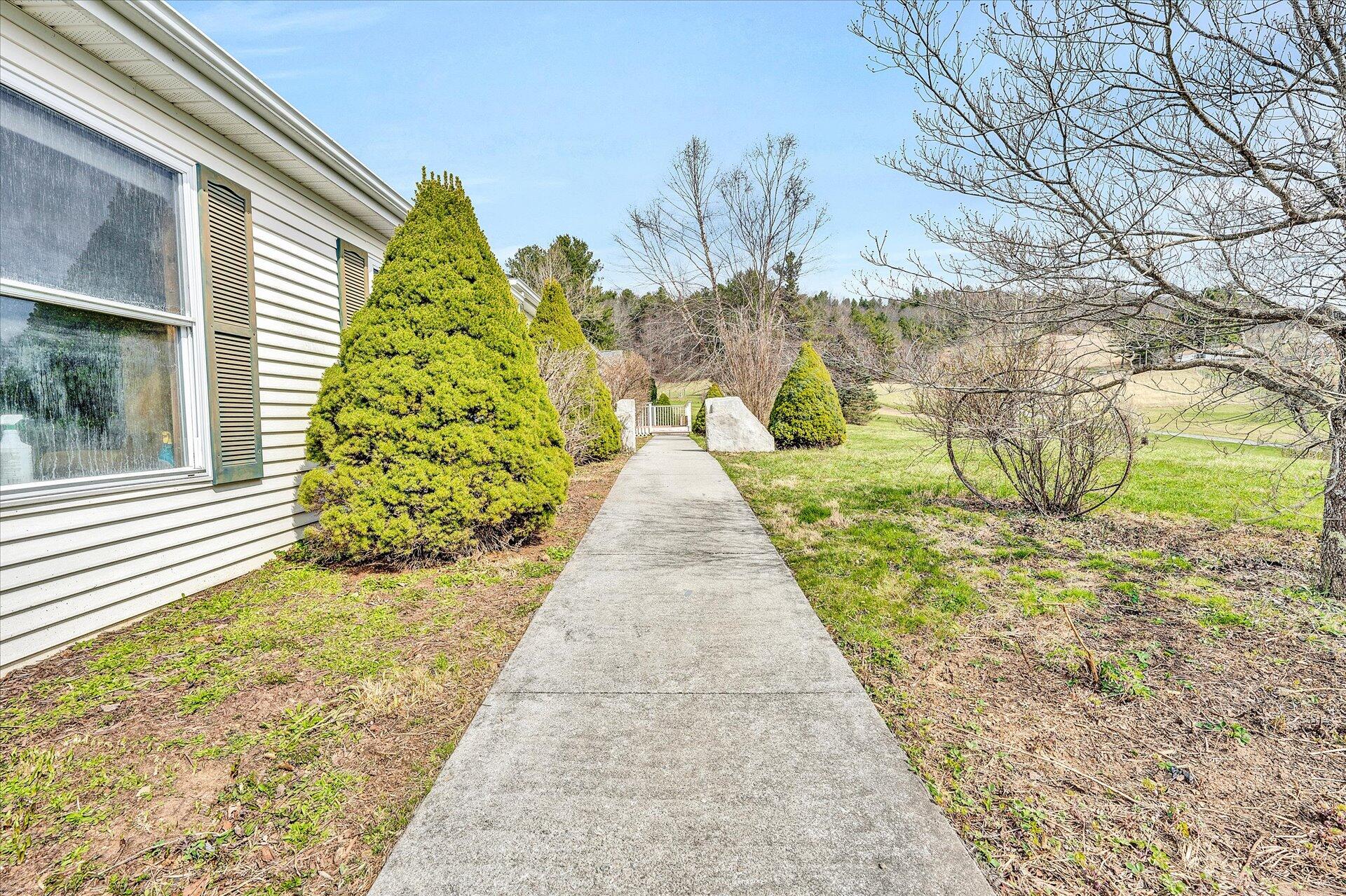 2121 Cannady School Road Southeast Floyd, VA 24091 - Photo 5 of 41 a view of a pathway both side of the house