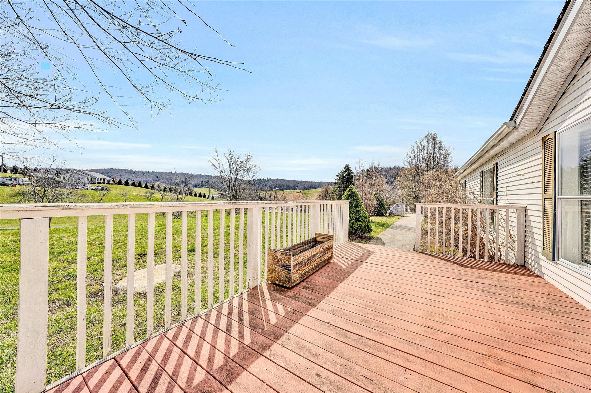 2121 Cannady School Road Southeast Floyd, VA 24091 - Photo 6 of 41 a view of balcony with wooden floor and fence