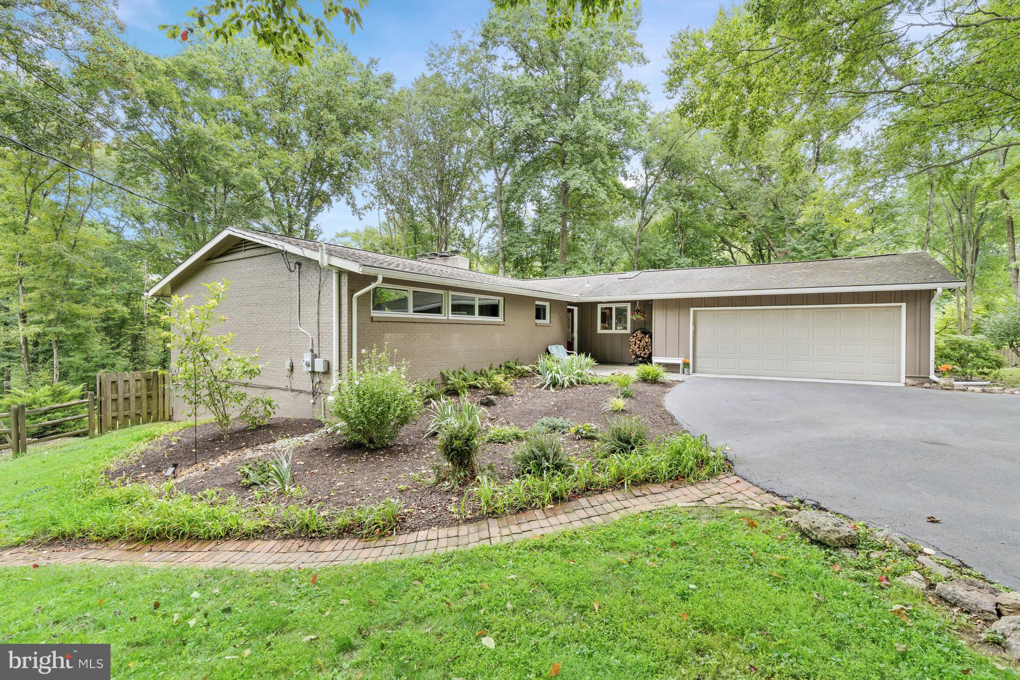 Turned view of home and garage