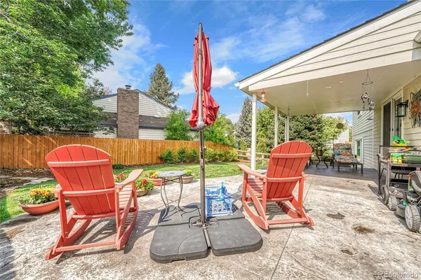 a view of a chairs and tables in the patio