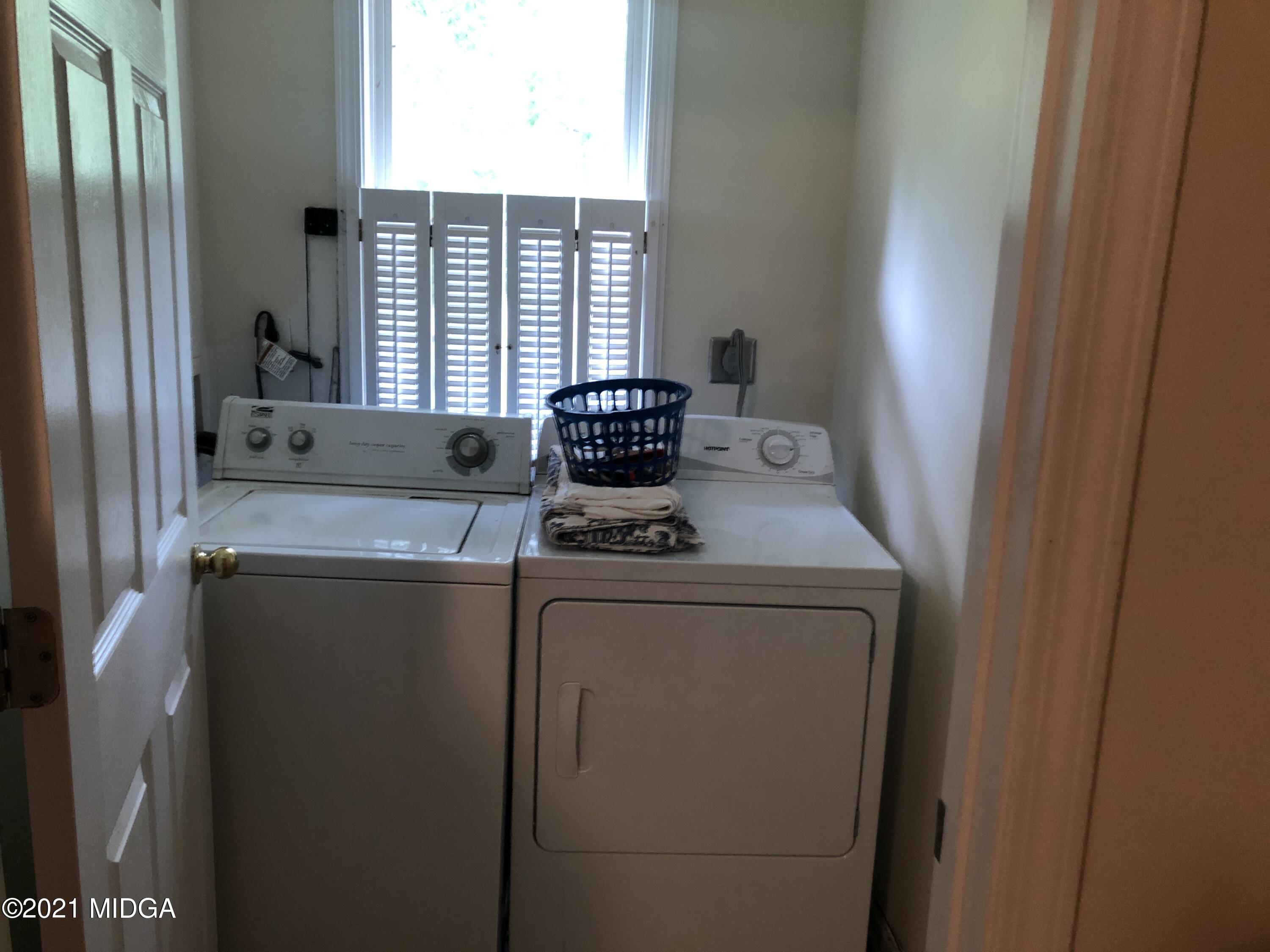 339 Wheeler Road Gray, GA 31032 - Photo 5 of 11 a view of washer and dryer with washer