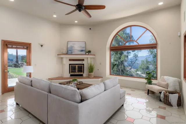 a view of a kitchen with a sink and a refrigerator