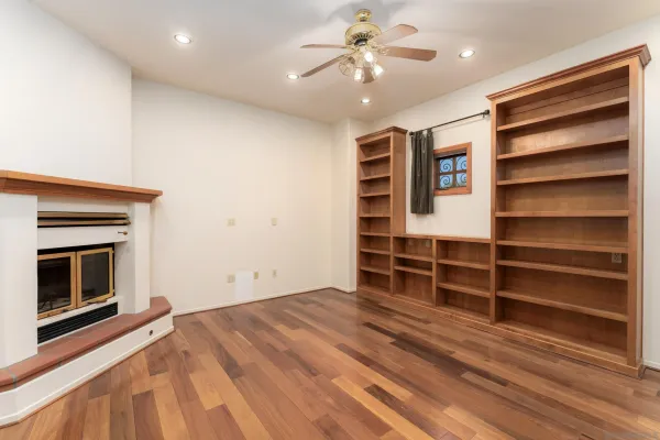 a bathroom with a sink mirror and vanity