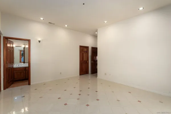 a view of a street with stores