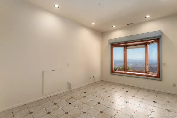 an aerial view of a house with a garden